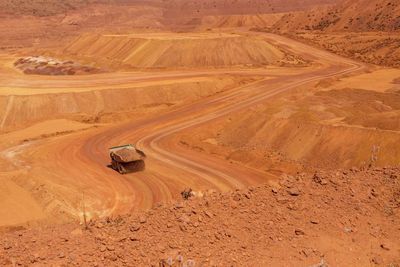 Former top BHP economist urges tougher government policies to push miners to decarbonise
