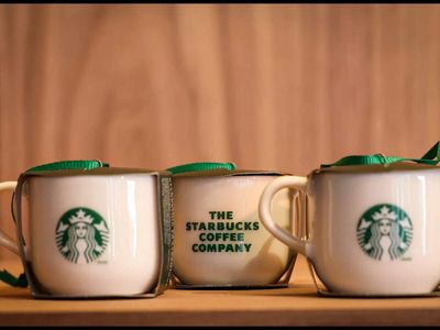 Starbucks taps tech's wonder kid and serves Microsoft, IBM a cold brew