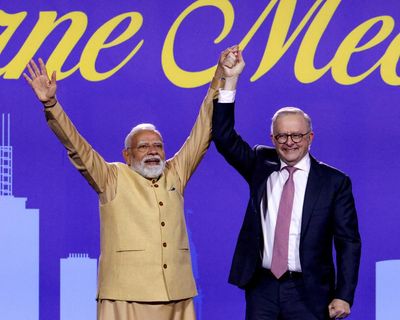 ‘Like a father to us’: pride and protest as thousands flock to see Narendra Modi in Melbourne