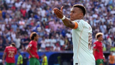 Mbappé plays down injury fears after France beat Morocco to reach World Cup semis