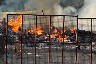 Bonfire topped with replica mosque set alight before bid to remove hate display