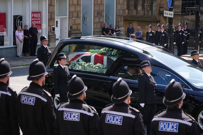 Police form guard of honour at funeral of young officer fatally injured on duty