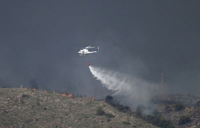 Eleven dead as wildfire roars through southern Spain
