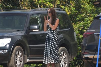 Kate cheers on William in sweltering charity polo match