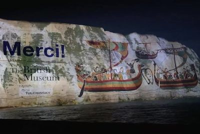 Britain sends message to France on white cliffs of Dover as Bayeux Tapestry arrives overnight