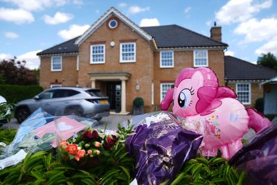 Man charged with triple murder over death of wife and two daughters