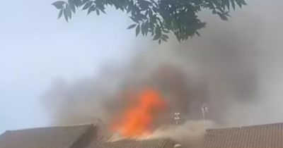 Firefighters battle blaze as flames tear through Glasgow home