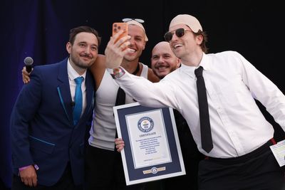 Pitbull breaks world record for largest gathering of people wearing bald caps at BST concert