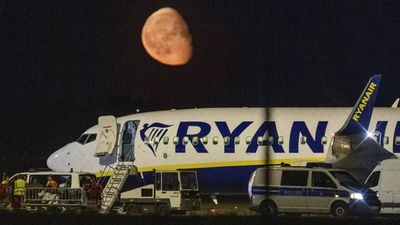 Passenger partially sucked through window after Ryanair flight suffers mid-air emergency - video