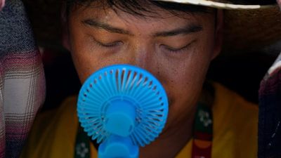 ‘I froze my pyjamas’: What Europeans can do to cool down without air con – and what actually works