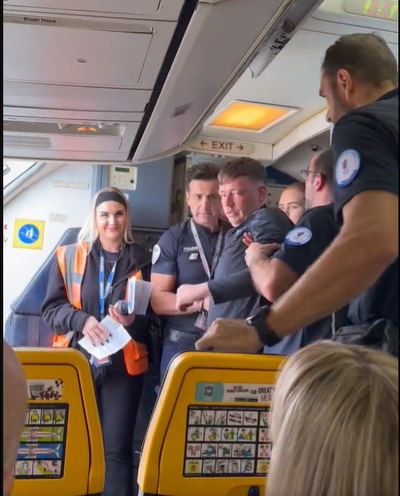 Ryanair passenger nearly sucked out of plane as head and shoulders hang from shattered window after aircraft plunges 9,000 feet