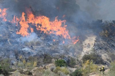 Spanish firefighters gain upper hand on deadly blazes