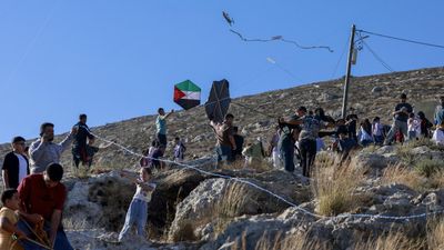 'This is our sky': Palestinians fly kites in defiance of Israeli settlers in West Bank