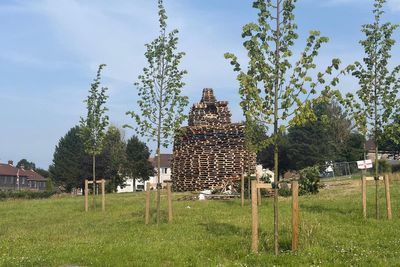 Man dies after falling from bonfire in Belfast