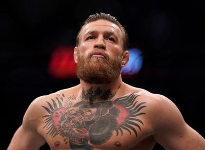 McGregor's hyped UFC return halted by injury in first minute