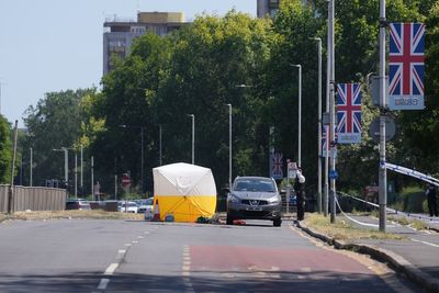 Man arrested over murder of 24-year-old woman in double stabbing