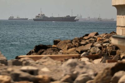 Ships pass through Strait of Hormuz in secret as US and Iran trade strikes