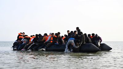 Record 128 migrants cross Channel in one boat as overall numbers drop