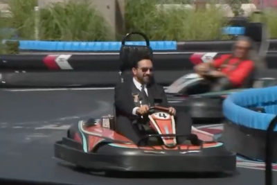 Zohran Mamdani races go-karts in his ever-present suit at Coney Island