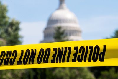 Man arrested at Capitol barricade had a gun in his lap, police say