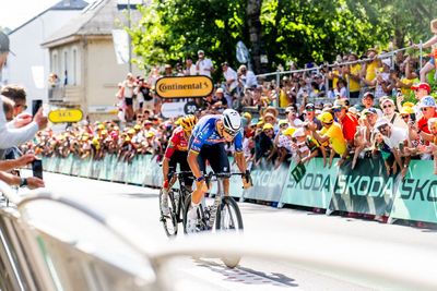 Eight injured after press car crashed through barriers 500 metres before Tour de France stage finish in Corrèze