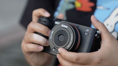 This tiny pancake lens only weighs as much as a tennis ball – and borrows a feature from point-and-shoots that means you'll never lose another lens cap
