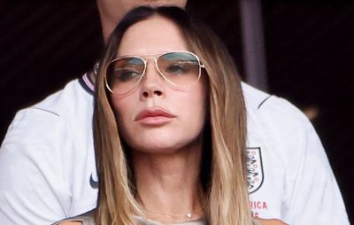 Victoria Beckham proves that a silky draped top is the key to making your white jeans outfits look luxurious