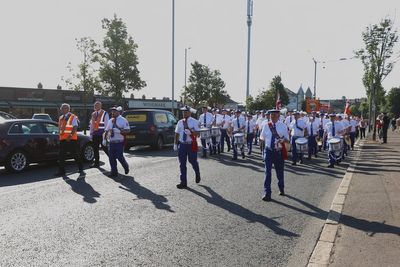 Orange parade past former Belfast flashpoint passes without incident