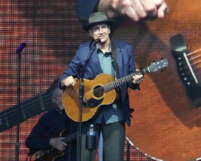 James Taylor review – 70s legend’s golden baritone shines best when stripped bare