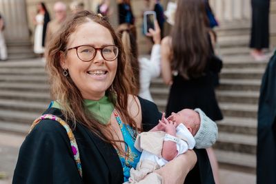 Mother graduates with first-class degree hours after giving birth to baby boy
