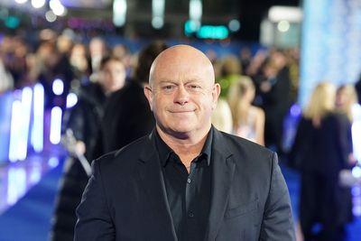 Ross Kemp kisses England shirt as Alan Carr has face painted in support