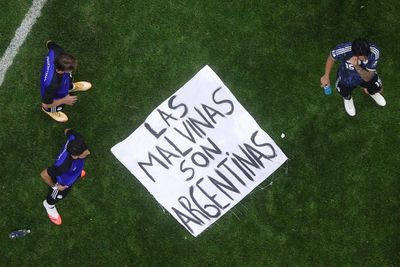 Argentina players unfurl Falklands banner after England win – have they been punished before?