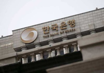 BOK hikes rates for first time in 3-1/2 years, signals more