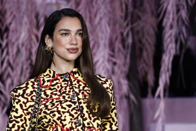 Dua Lipa Rewears Her Signature Bandana in a Boho Biker Look That Defines Celebrity Style