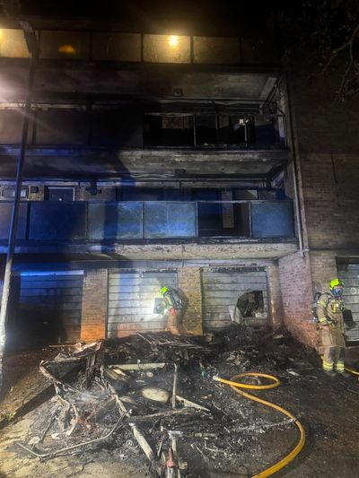 Six people rescued from burning block of flats as cars are torched in south-east London