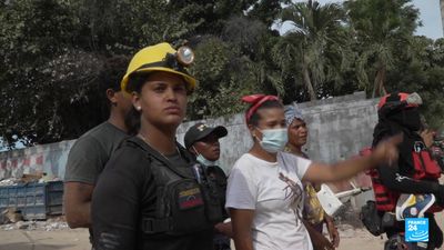 Venezuelans dig to find their loved ones