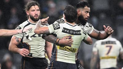 Walsh wizardry helps Broncos edge past Panthers