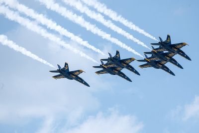People were sent running after a Blue Angels jet screamed over a Florida beach