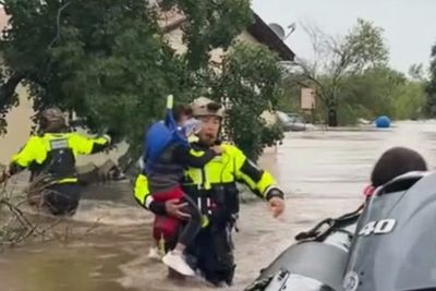 Child wearing snorkel is rescued from catastrophic flooding close to Camp Mystic
