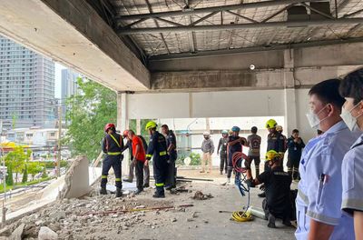 One dead, one critically injured after concrete slab falls from Bangkok building