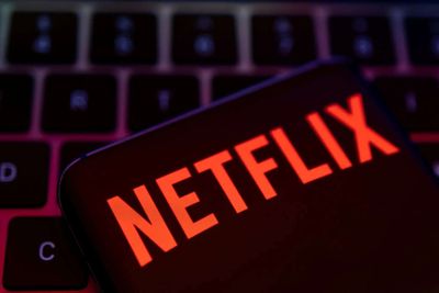 Netflix tumbles as slowing growth, less viewership data spook investors