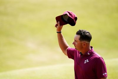 Lucas Herbert leads Open after equalling record for lowest score at men’s major