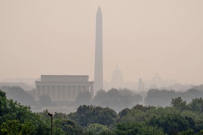 Wildfire smoke from Canada and Minnesota pushes further into US, engulfing DC in eerie haze