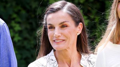 Yes, you can style black in summer - Queen Letizia's monochrome midi and elegant espadrilles prove it and we're copying her