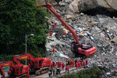 Rescuers in China race to find survivors after landslide kills at least 8