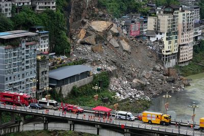 12 dead as flash flooding and landslides hit China and Vietnam