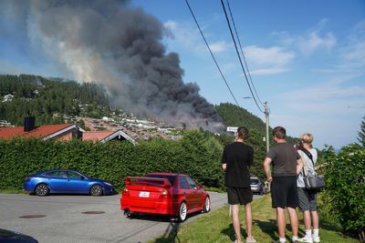 ‘Not under control’: Firefighters battle largest blaze in Norway’s history as 100 homes destroyed