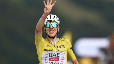 Pogacar wins 'unforgettable' Tour de France 14th stage to extend overall lead