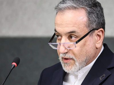 Iran says it is suspending commitments to interim deal with US as they exchange attacks
