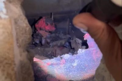 Woman found buried in 155-year-old temple hall